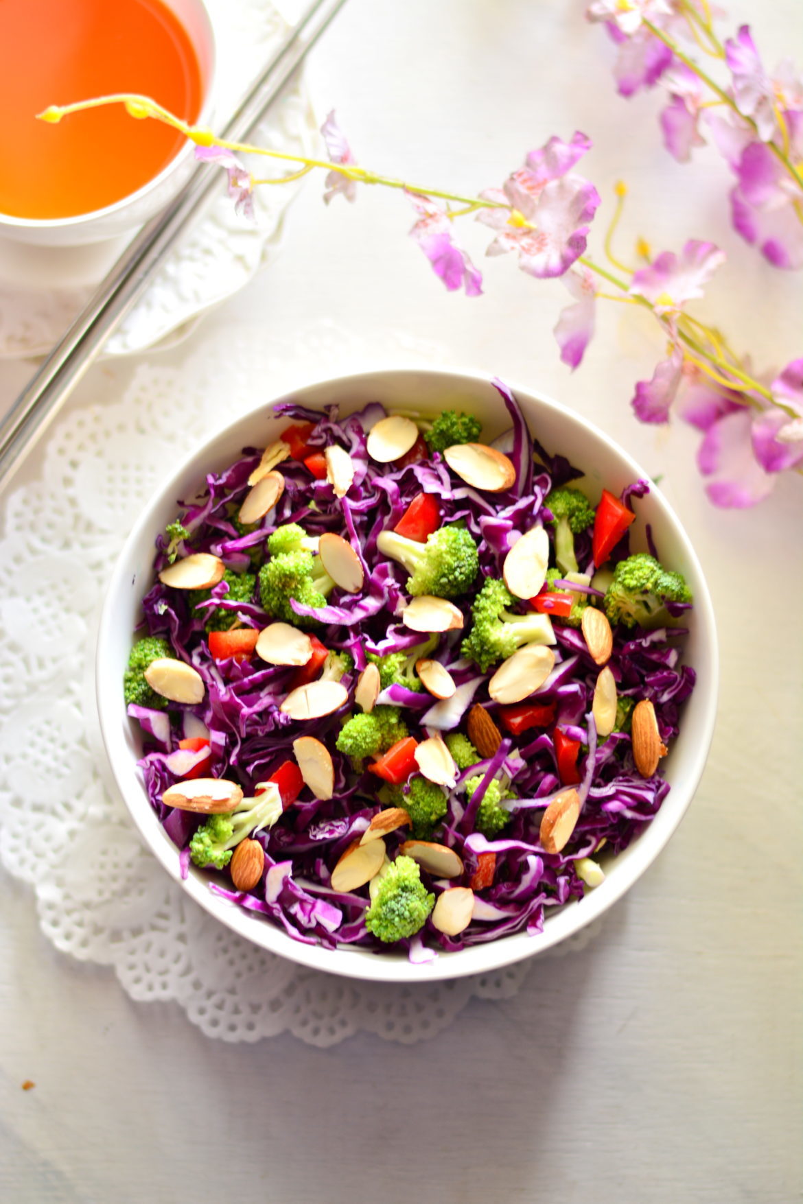 Purple Cabbage & Broccoli Salad with Miso Orange & Almond Dressing